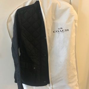 Women’s size Medium black Coach jacket.